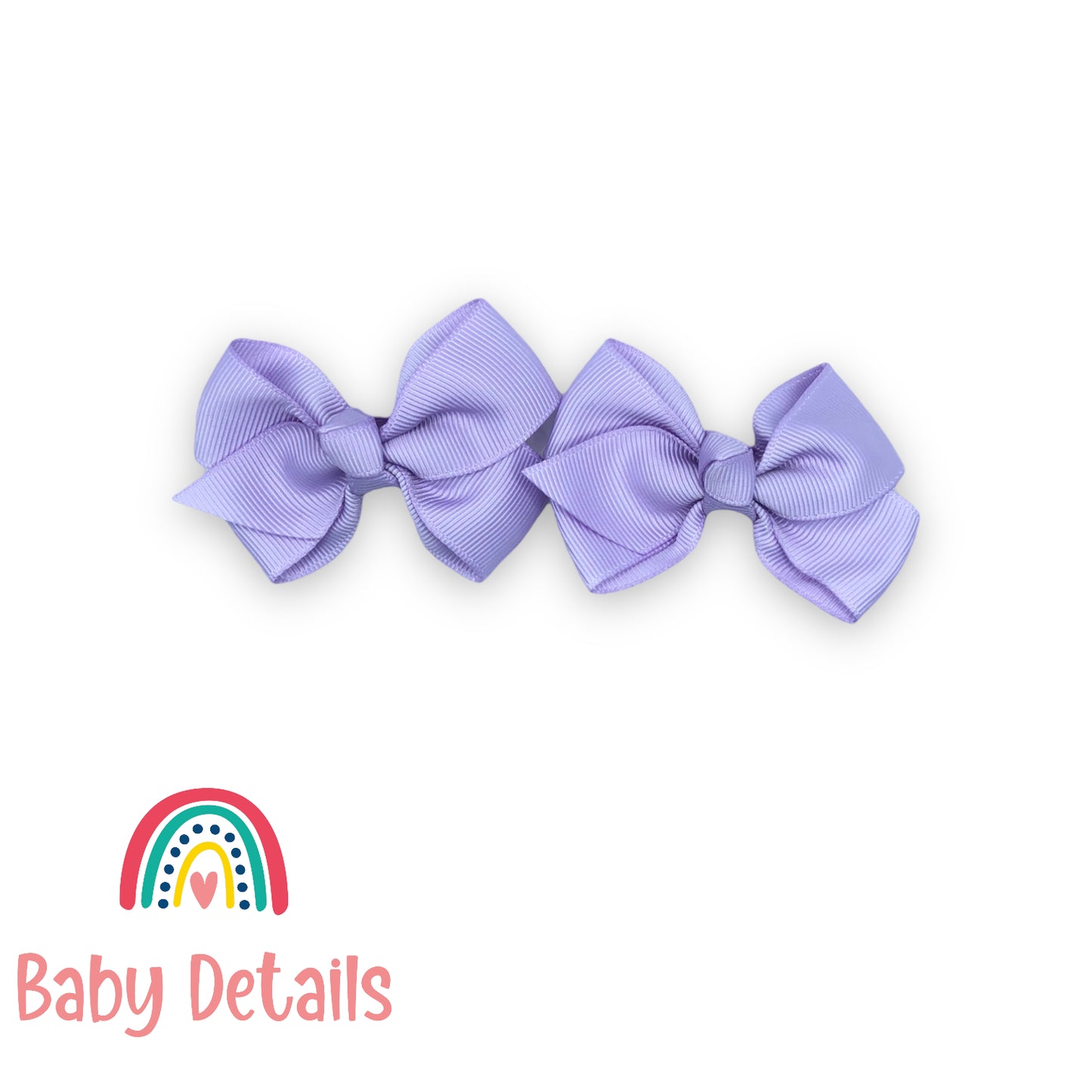 Double purple bow hair clips