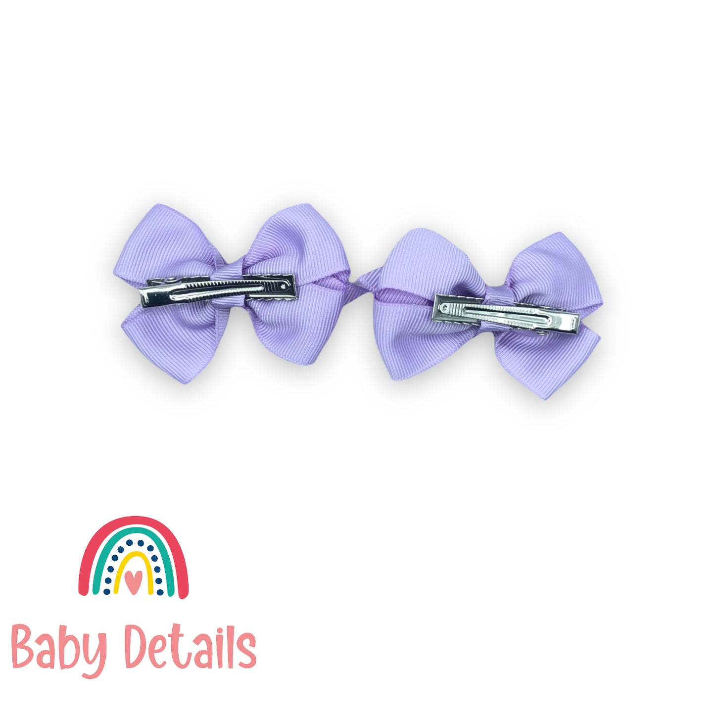 Double purple bow hair clips